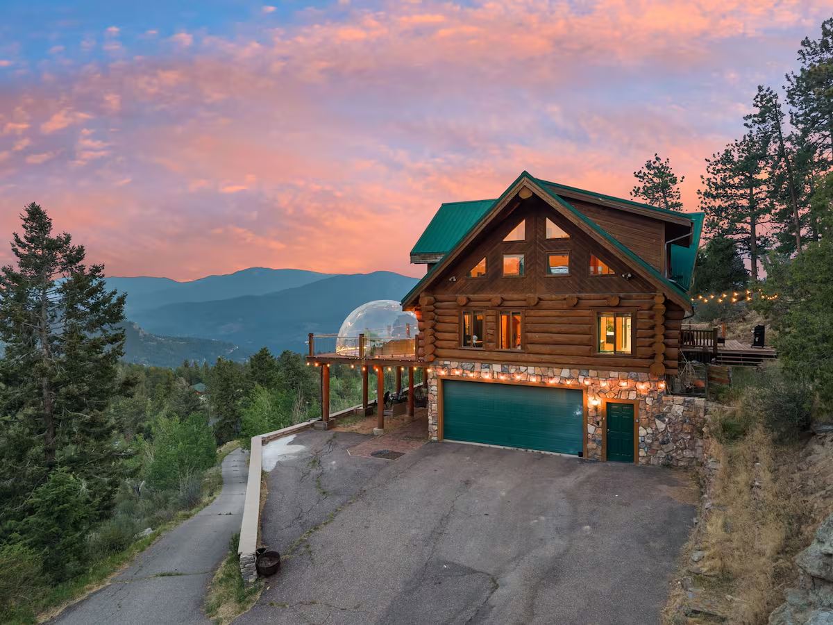 Off-market Airbnb investment opportunity at 5 Pinecrest Circle, Bailey, Colorado, a log cabin with a bubble dome and mountain views